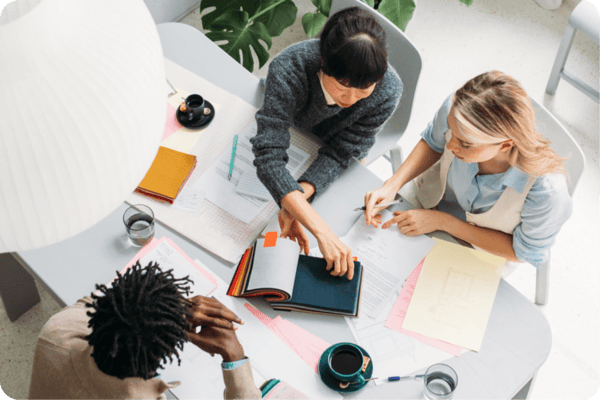 Two women looking at a laptop together